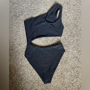 Brand new Lulus black one piece bathing suit.